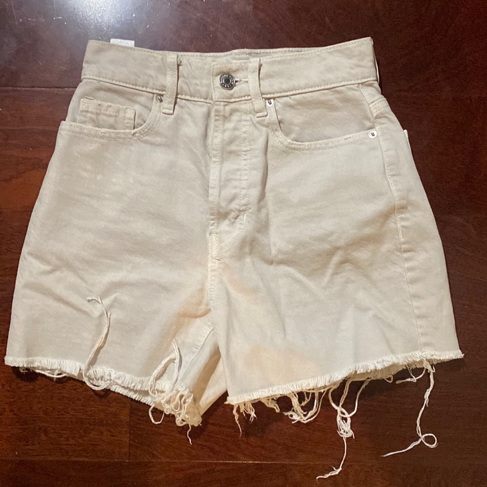 Pacsun beige jeans shorts high waisted size 22. small bleach stain on left side